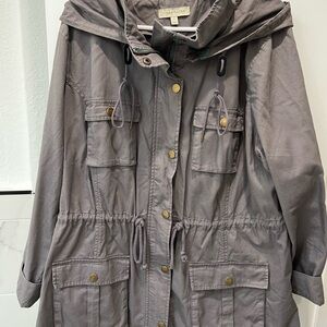 Grey jacket with removable zipper hood.  Drawstring waist. Worn once.